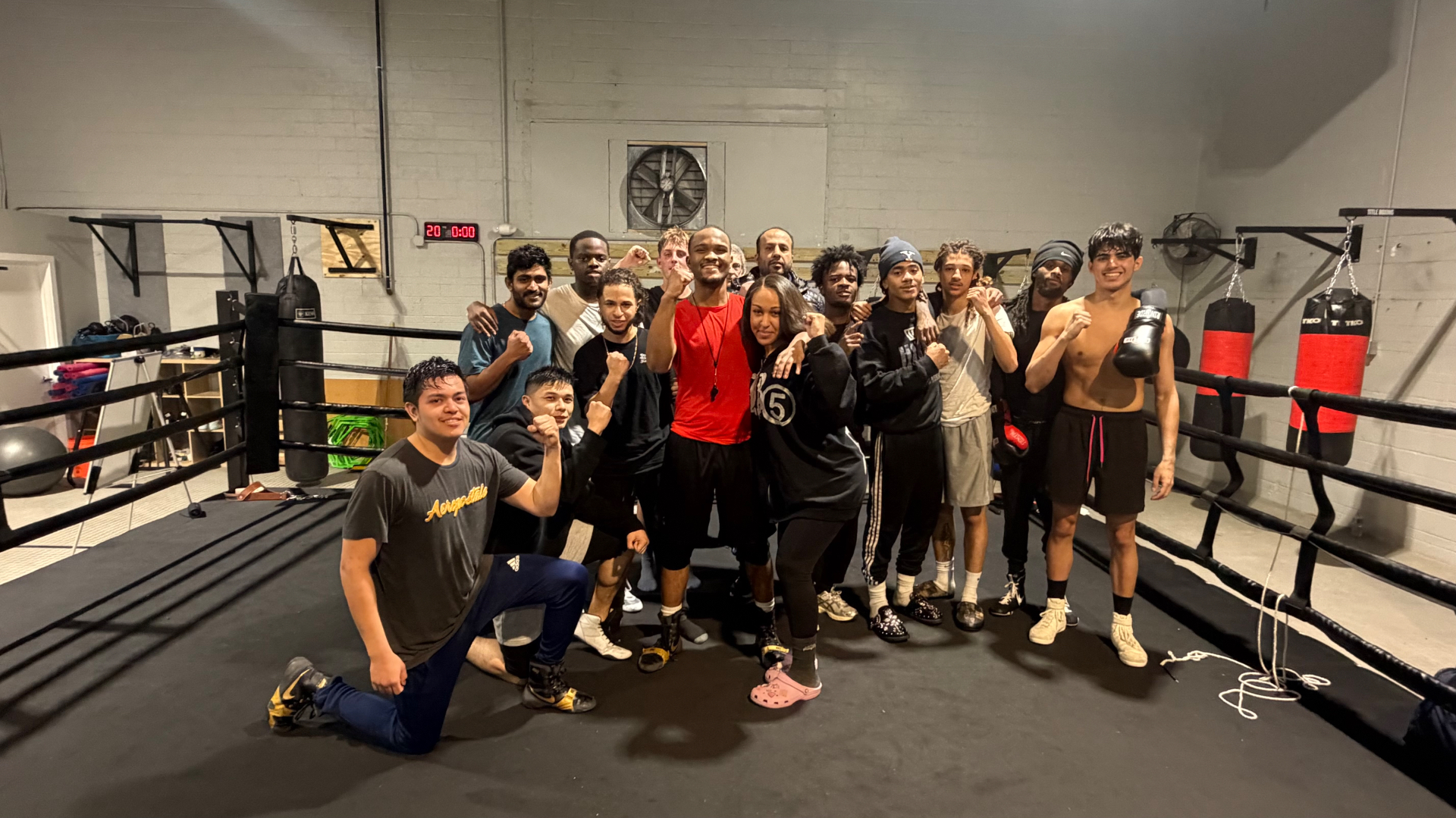 Coach Josh Boxing class group photo inside the Hamden, CT gym ring