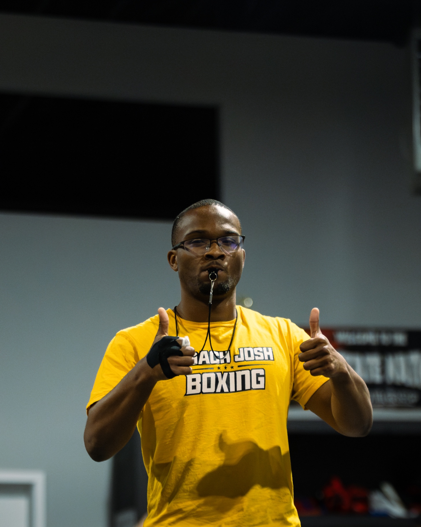 Coach Josh giving two thumbs up during class at the Hamden, CT boxing gym