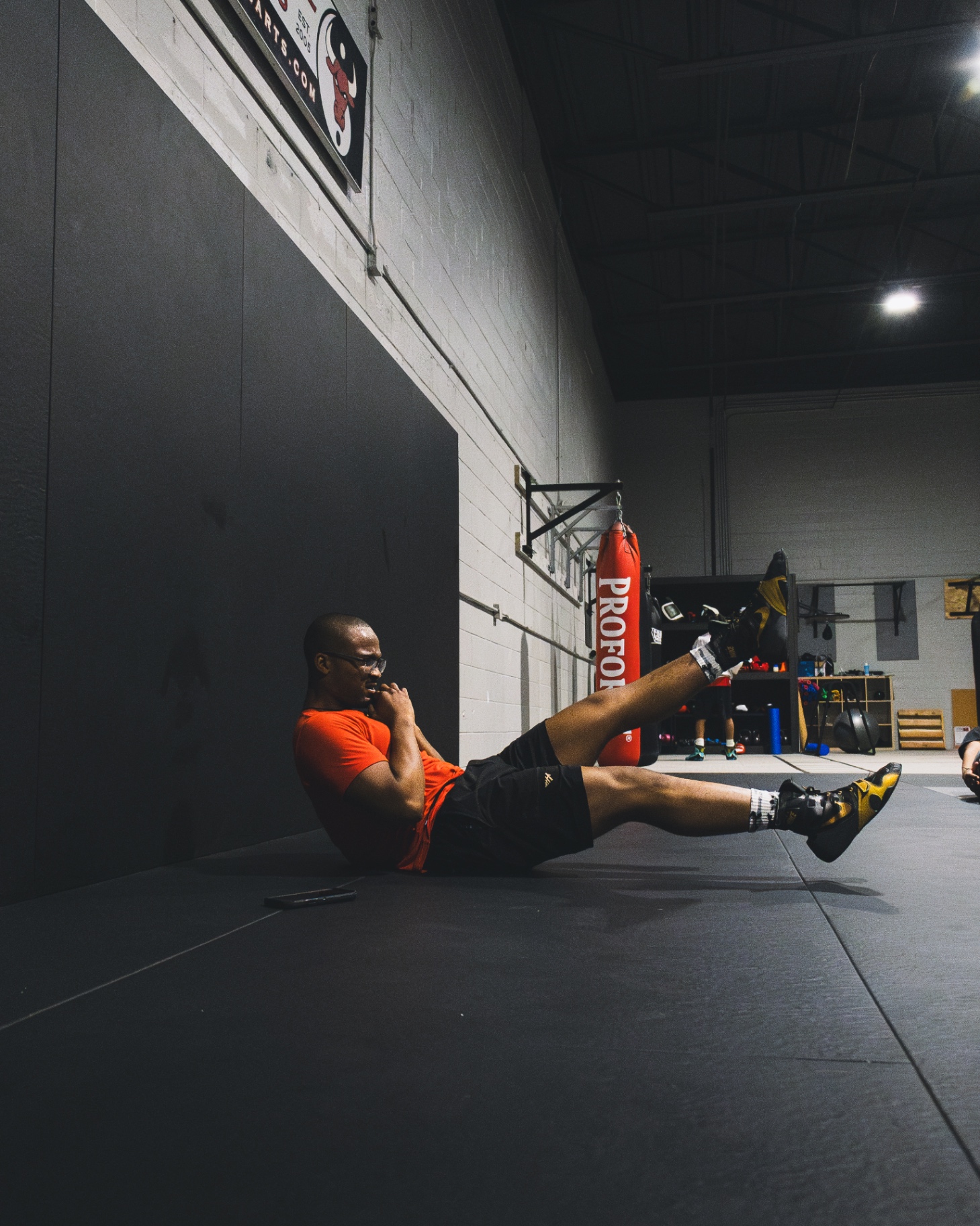 Coach Josh doing core conditioning work in the gym